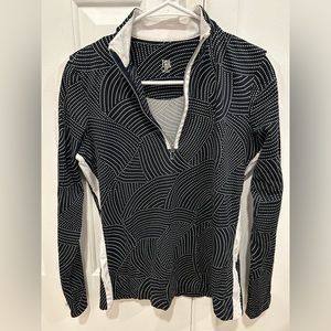 Tail.  Activewear Polo tshirt black and white, size xs